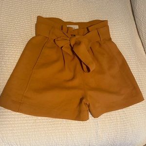 Wilfred high-waisted mustard shorts in size 6